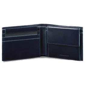 Interno del portafogli aperto con scomparti porta carte di credito, tasca portamonete con pattina e profili azzurri.